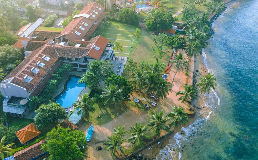 an aerial view of a resort with a swimming pool at Earl's Reef in Bentota