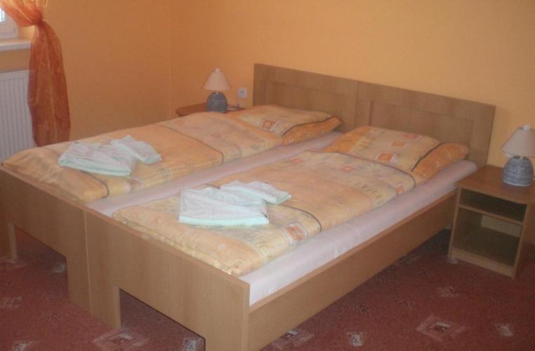 Postel nebo postele na pokoji v ubytování Penzión Aston