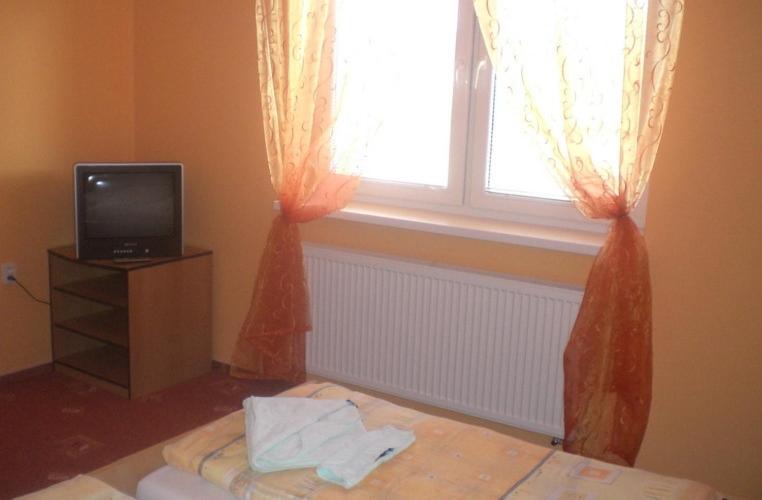 Postel nebo postele na pokoji v ubytování Penzión Aston
