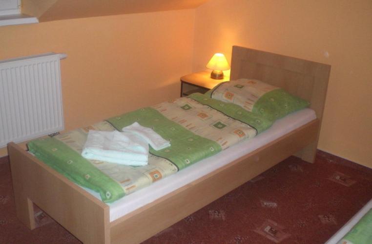 Postel nebo postele na pokoji v ubytování Penzión Aston