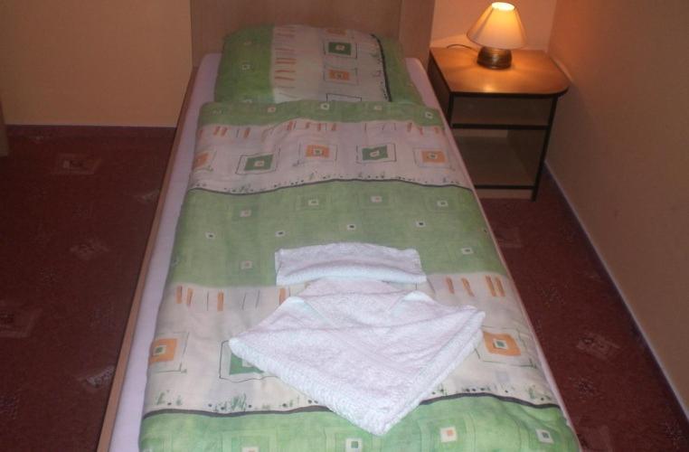 Postel nebo postele na pokoji v ubytování Penzión Aston