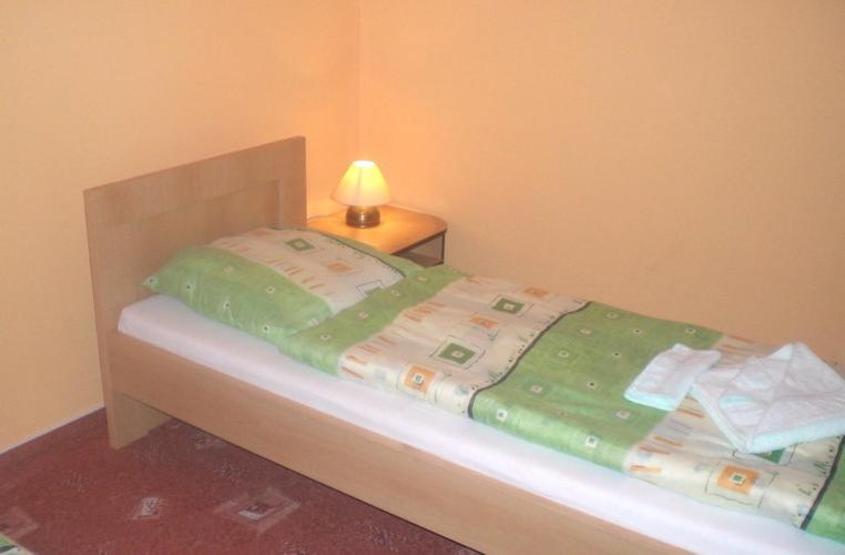 Postel nebo postele na pokoji v ubytování Penzión Aston