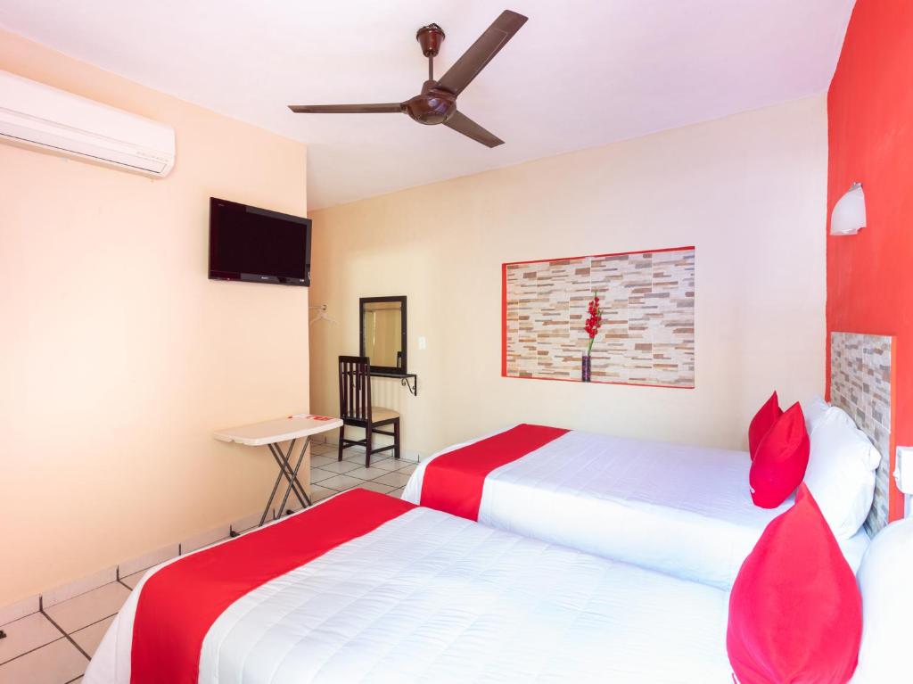 Postel nebo postele na pokoji v ubytování Hotel Costa Azul