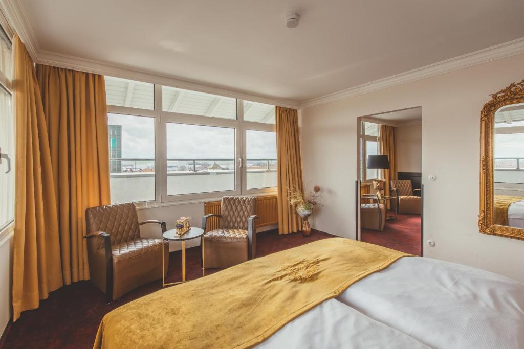 Voodi või voodid majutusasutuse Nordhäuser Fürstenhof & TinySky-Resort toas