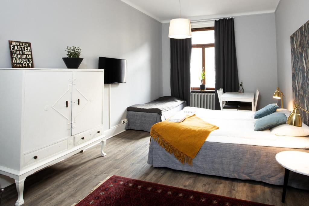 Postel nebo postele na pokoji v ubytování Systrar & Bönor Bed and Breakfast