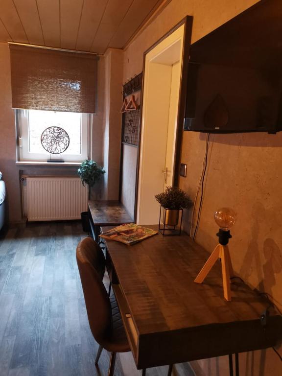 TV a/nebo společenská místnost v ubytování Pension Abshoff