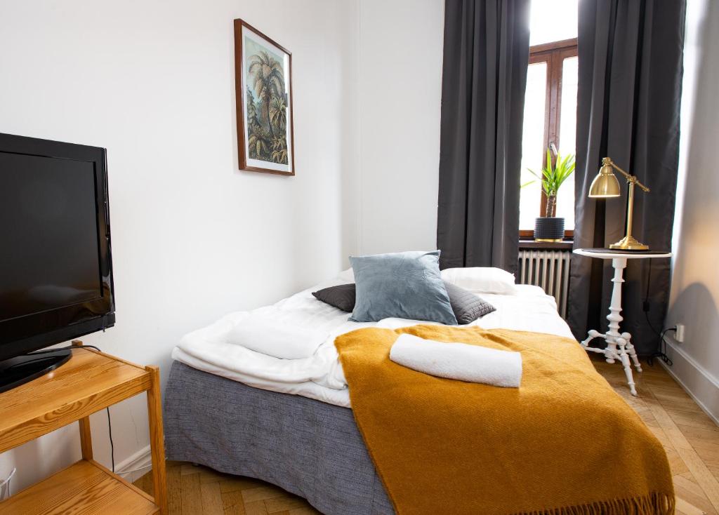 Postel nebo postele na pokoji v ubytování Systrar & Bönor Bed and Breakfast