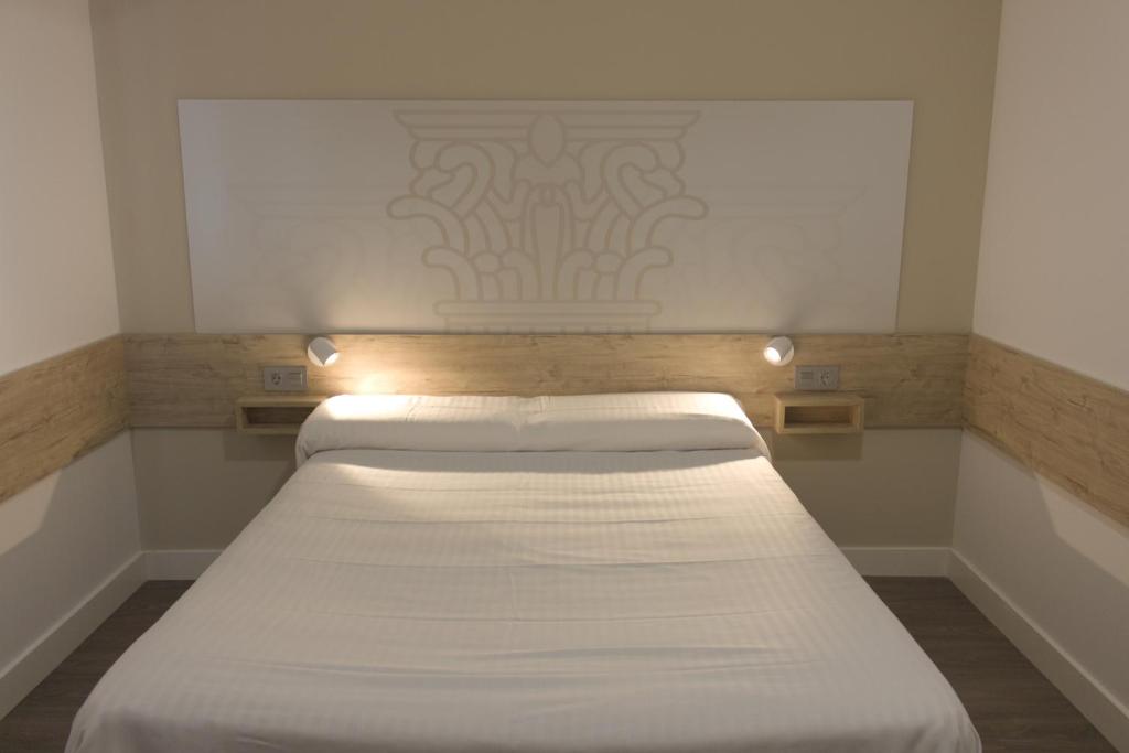 Postel nebo postele na pokoji v ubytování Deluxe Hostels & Suites Merida