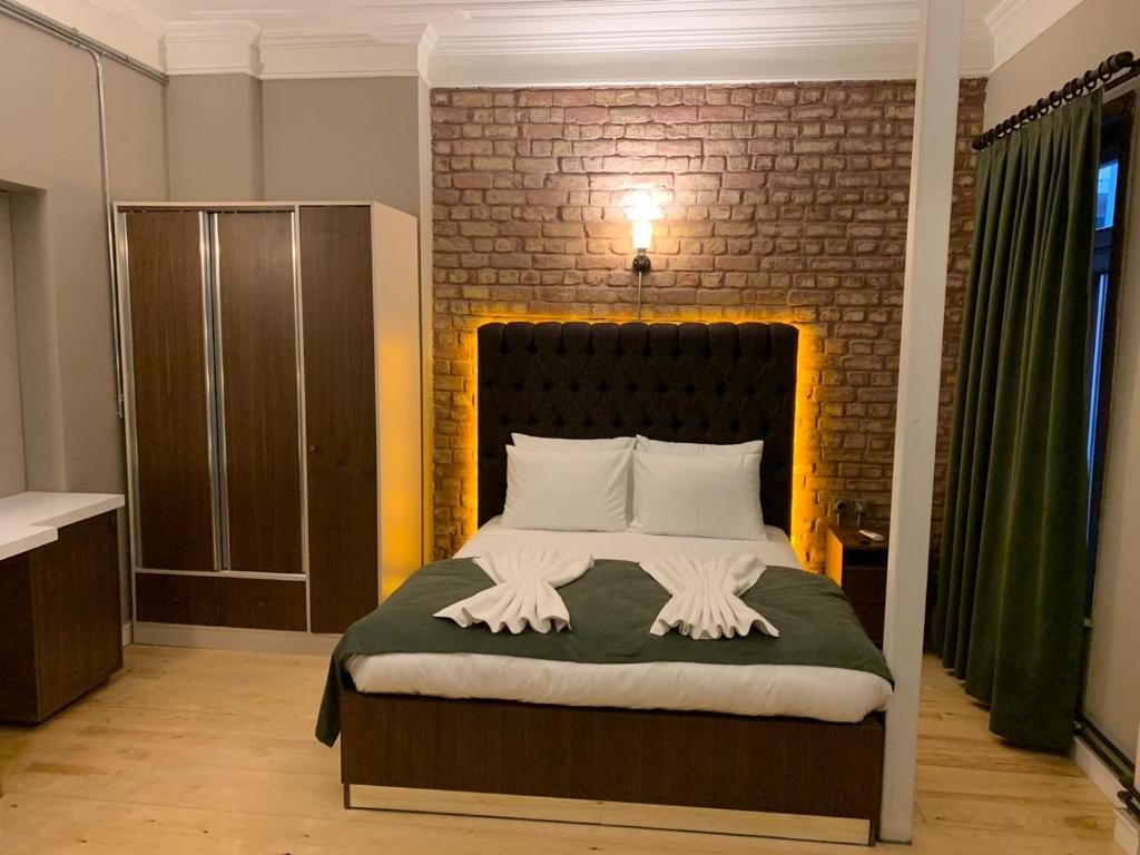 Postel nebo postele na pokoji v ubytování Berfinn Hotel Beşiktaş