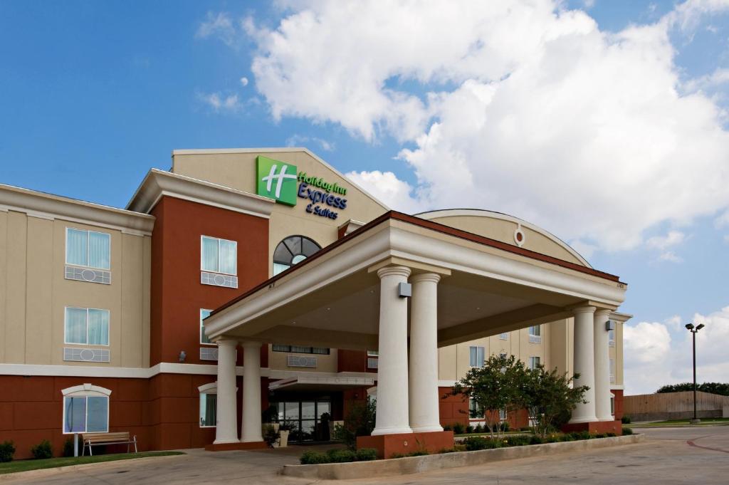 a hotel building with a hilton garden inn at Holiday Inn Express and Suites Snyder, an IHG Hotel in Snyder