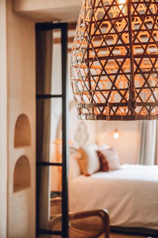 Postel nebo postele na pokoji v ubytování Nomad Hotel - Xábia Port