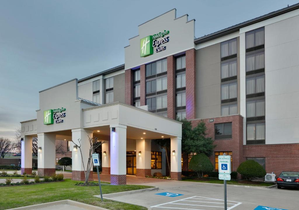 a rendering of the front of a hotel at Holiday Inn Express & Suites Irving Conv Ctr - Las Colinas, an IHG Hotel in Irving