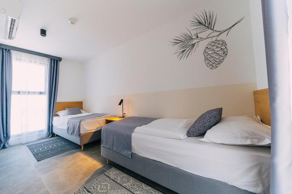 Posteľ alebo postele v izbe v ubytovaní MORENIA All Inclusive Hotel