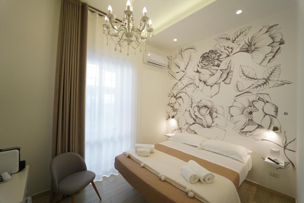 Postel nebo postele na pokoji v ubytování Il Diamante nei Sassi Rooms