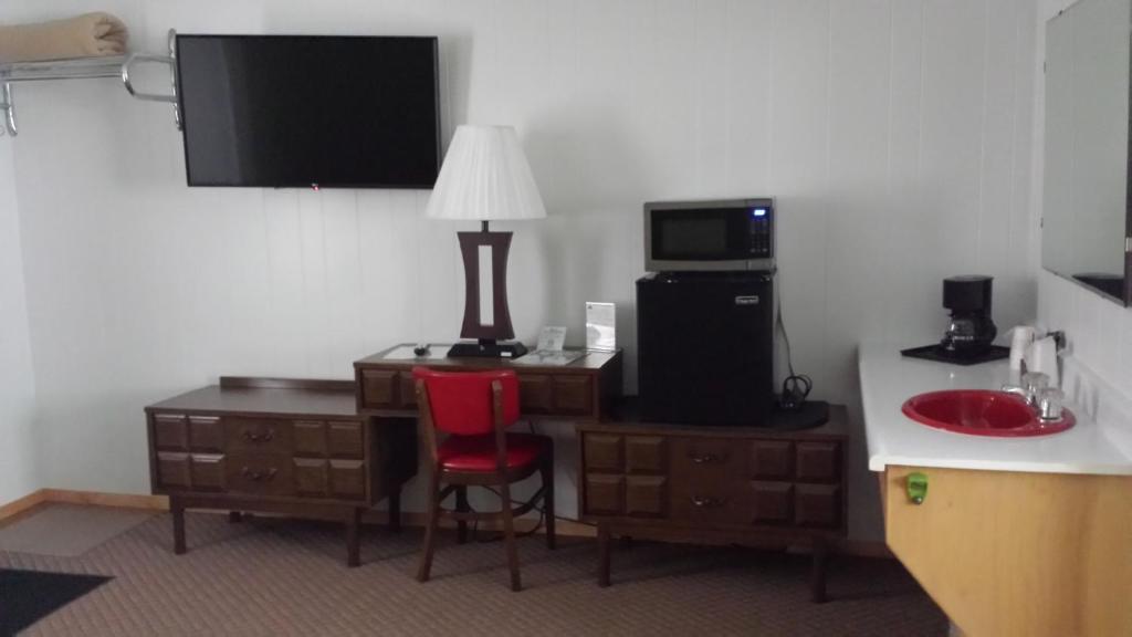 Kuchyň nebo kuchyňský kout v ubytování Cedars Motel