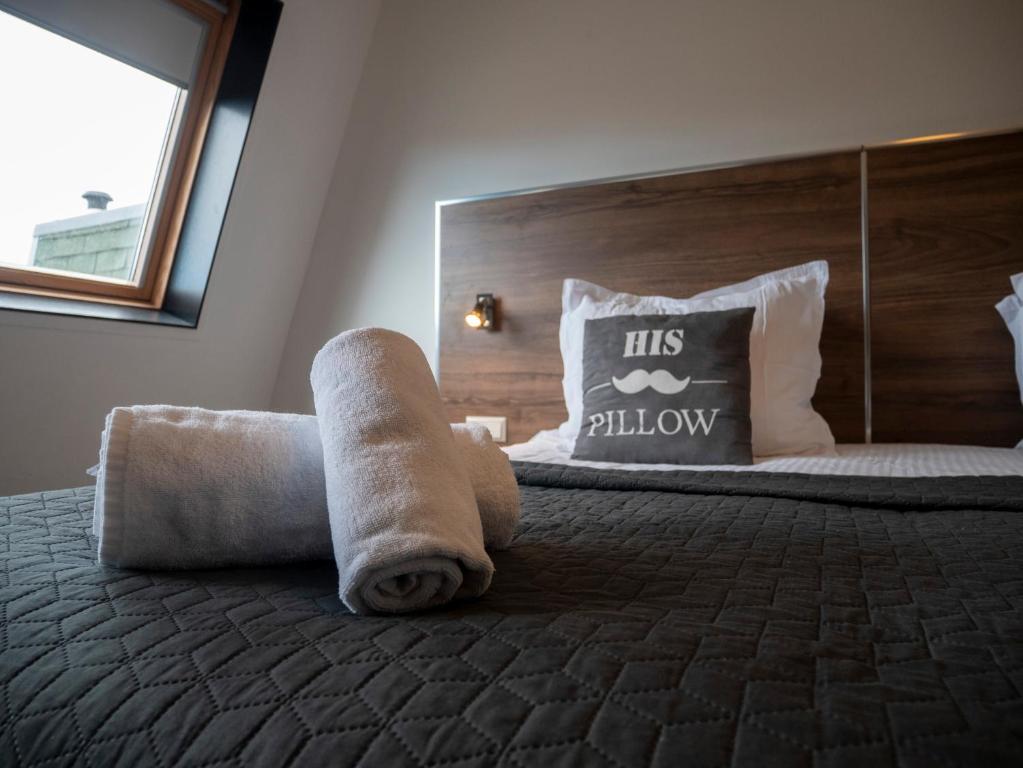 Postel nebo postele na pokoji v ubytování Hotel Hague Center