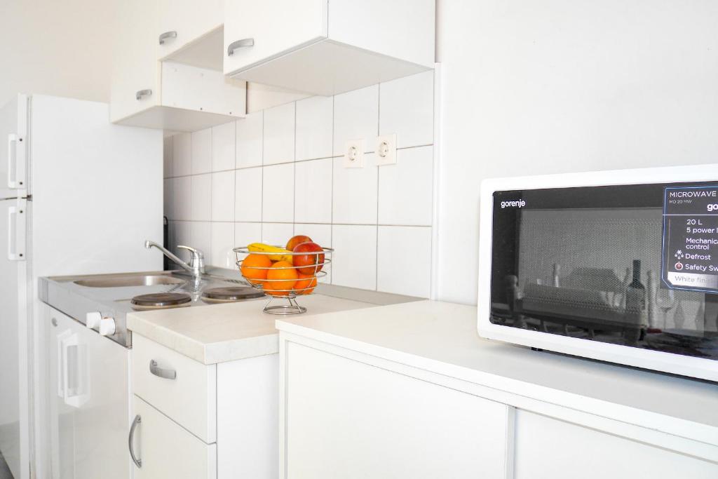 Kuchyňa alebo kuchynka v ubytovaní Apartments Beach Dugi rat