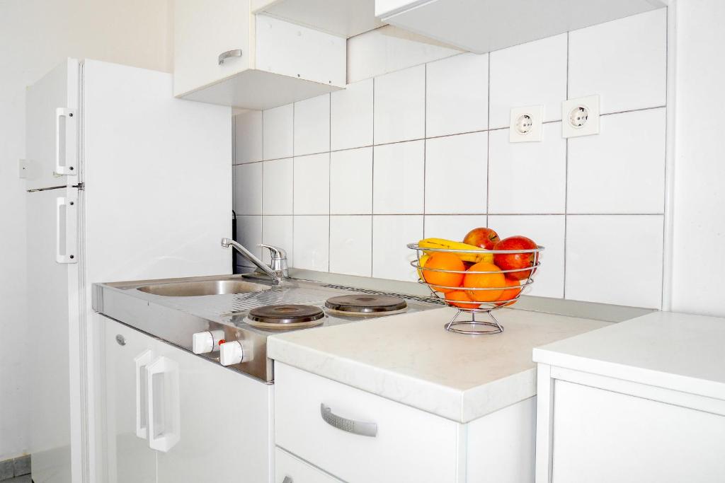 Kuchyňa alebo kuchynka v ubytovaní Apartments Beach Dugi rat