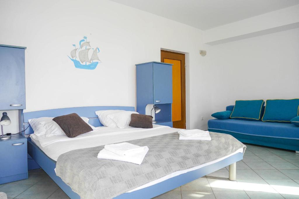 Posteľ alebo postele v izbe v ubytovaní Apartments Beach Dugi rat
