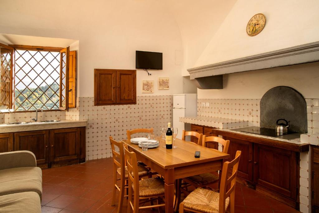 Kuchyň nebo kuchyňský kout v ubytování hu Norcenni Girasole village