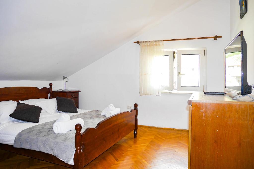 Posteľ alebo postele v izbe v ubytovaní Apartments Beach Dugi rat