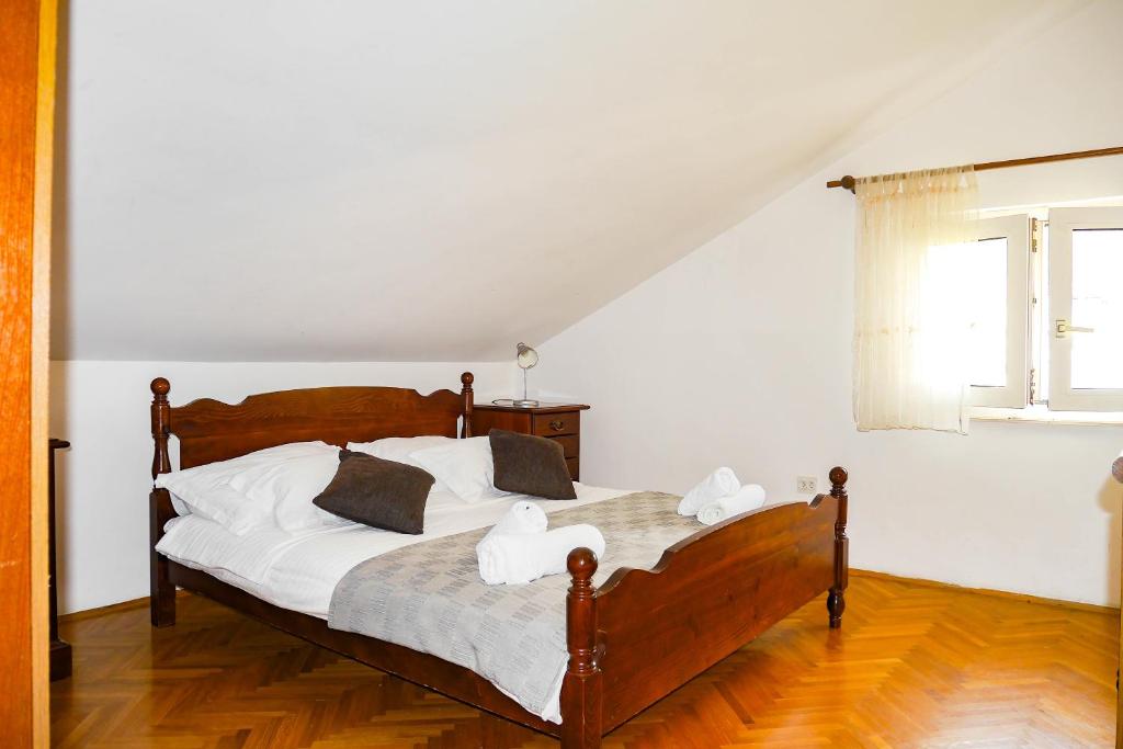 Posteľ alebo postele v izbe v ubytovaní Apartments Beach Dugi rat