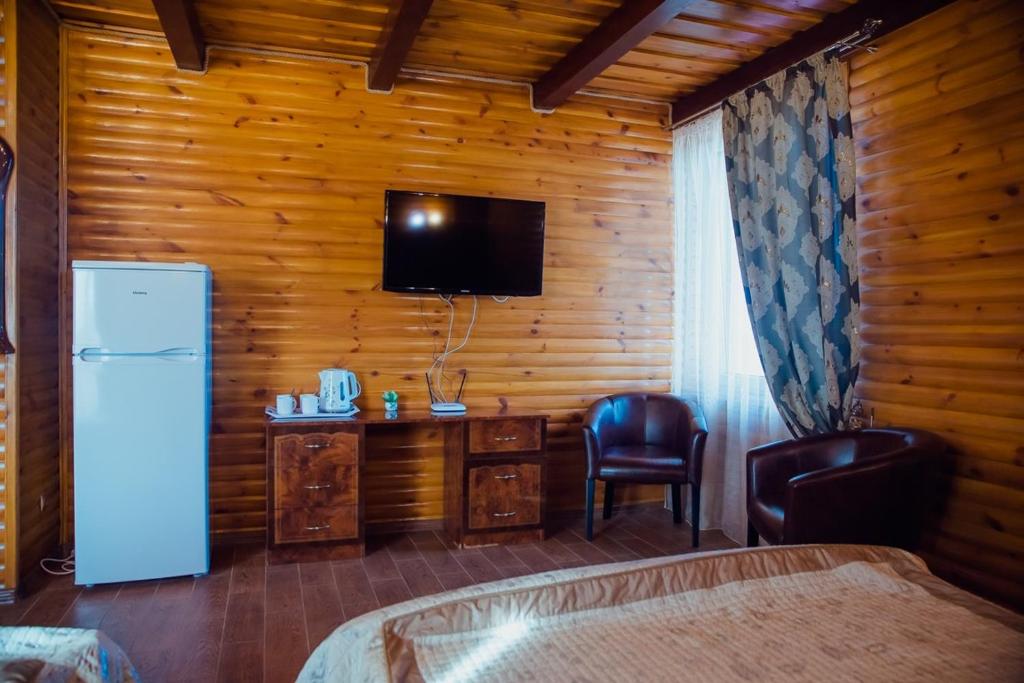 TV a/nebo společenská místnost v ubytování Villa Vi-Ta