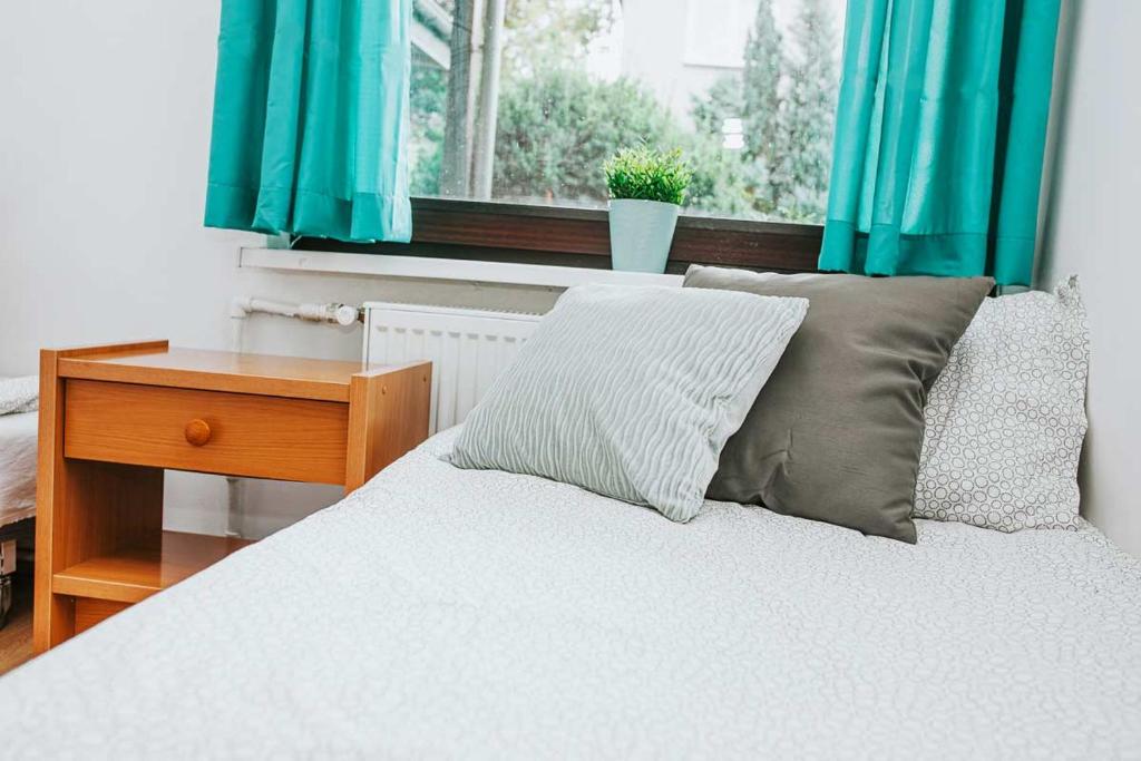 Posteľ alebo postele v izbe v ubytovaní Noclegi u Alicji agroHostel