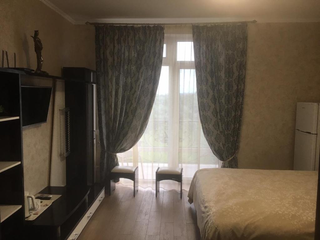 Postel nebo postele na pokoji v ubytování Villa Vi-Ta