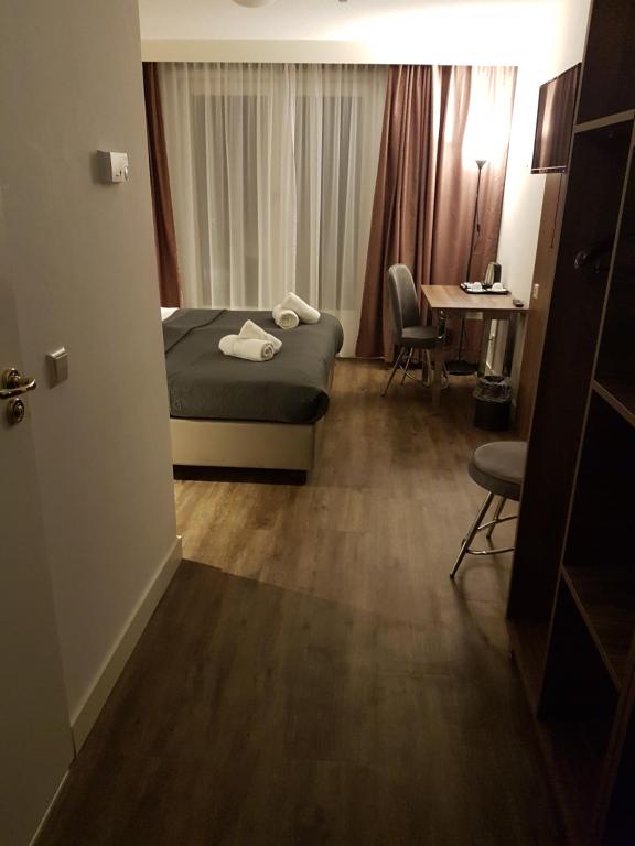 Postel nebo postele na pokoji v ubytování Hotel Hague Center