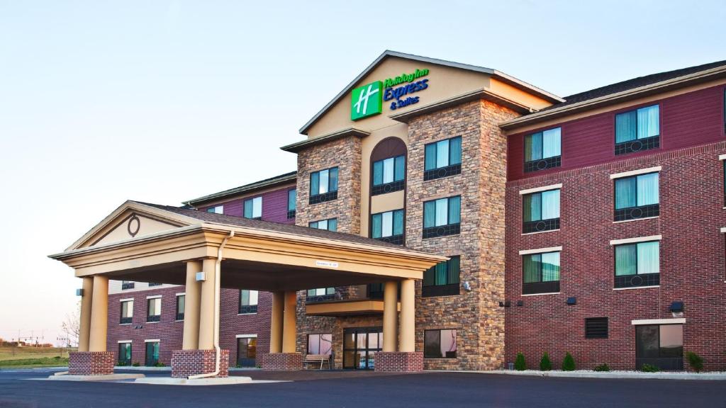 a hotel with a sign on the front of it at Holiday Inn Express & Suites Sioux Falls Southwest, an IHG Hotel in Sioux Falls