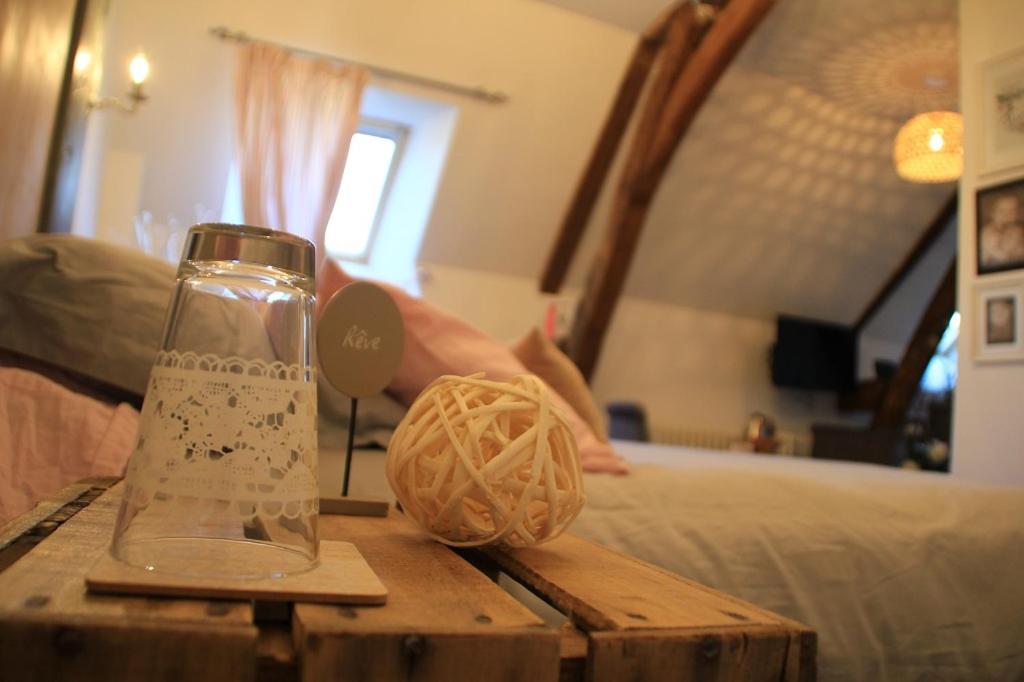Postel nebo postele na pokoji v ubytování Gîte La feuille d'Acanthe