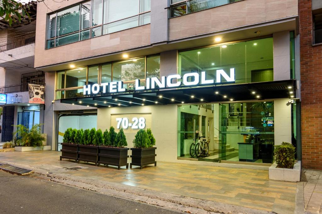 a building with a sign on the front of it at Hotel Lincoln in Medellín