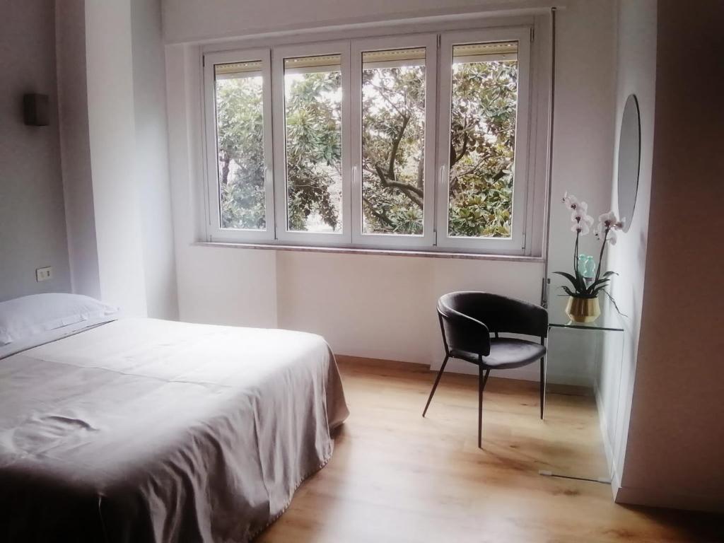 A bed or beds in a room at Guest House Arte