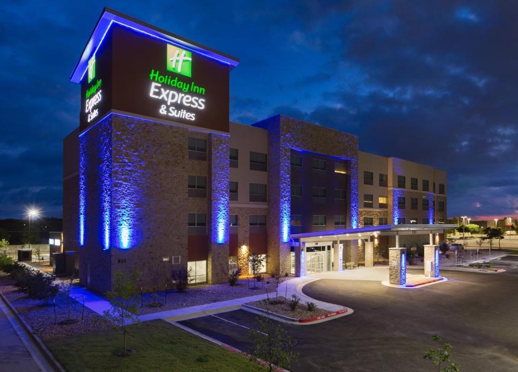 a hospital with blue lights on a building at Holiday Inn Express & Suites - San Marcos South, an IHG Hotel in San Marcos