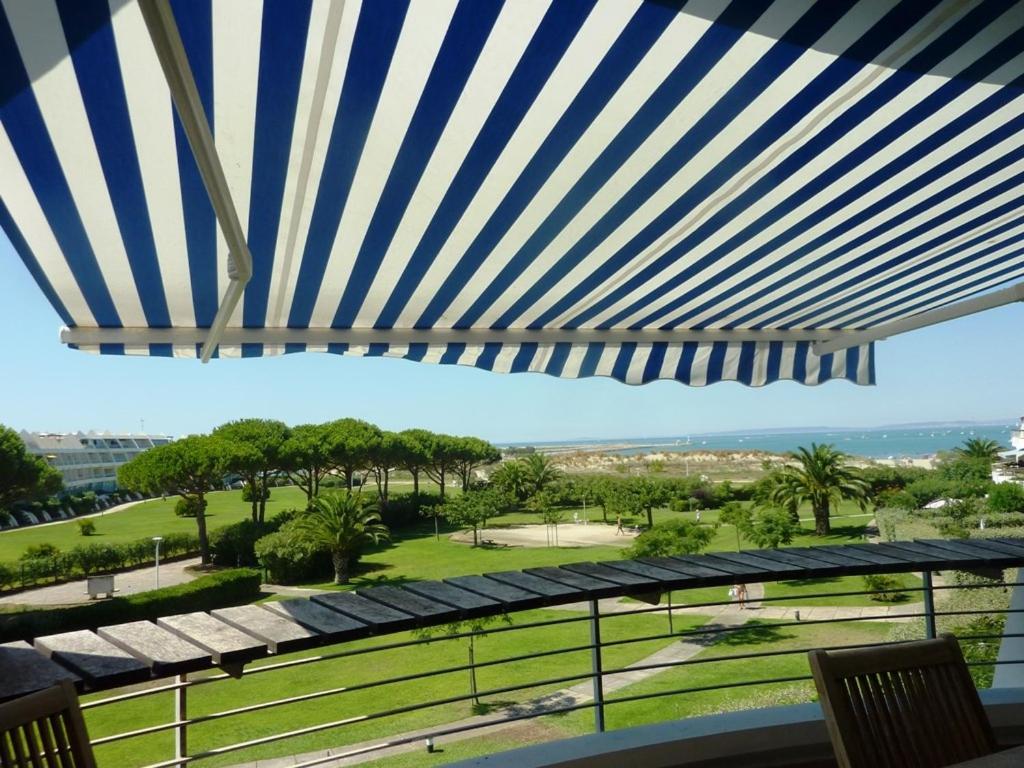 a view from the balcony of a resort at AS13247 - P2 Cabine climatisé avec belle vue sur la Mer in Le Grau-du-Roi