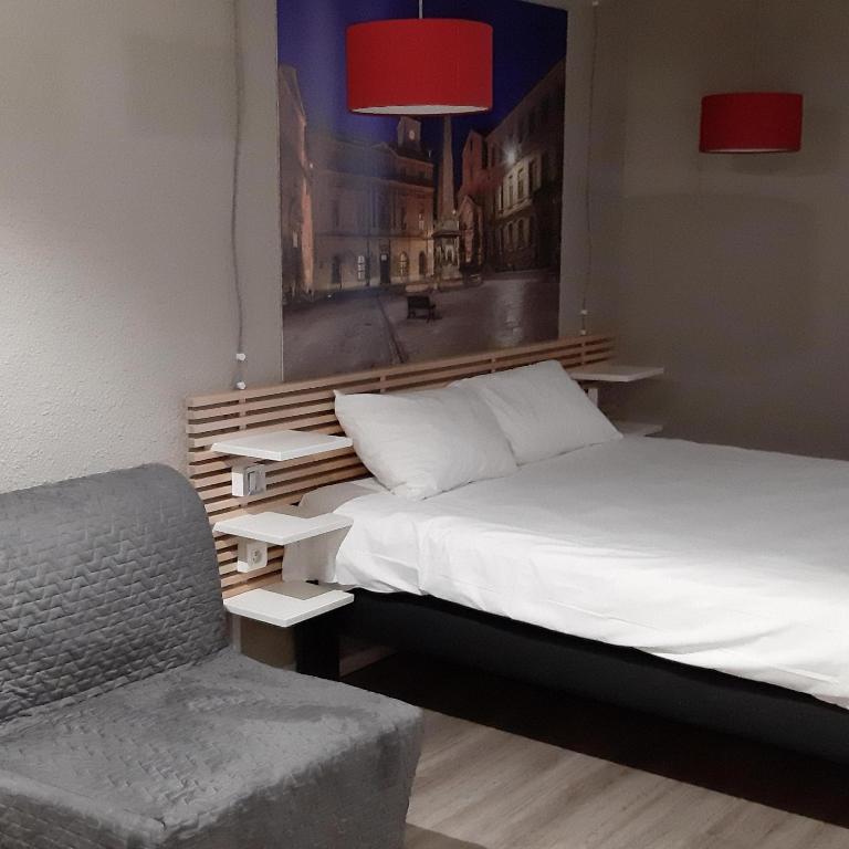 Postel nebo postele na pokoji v ubytování ibis Arles