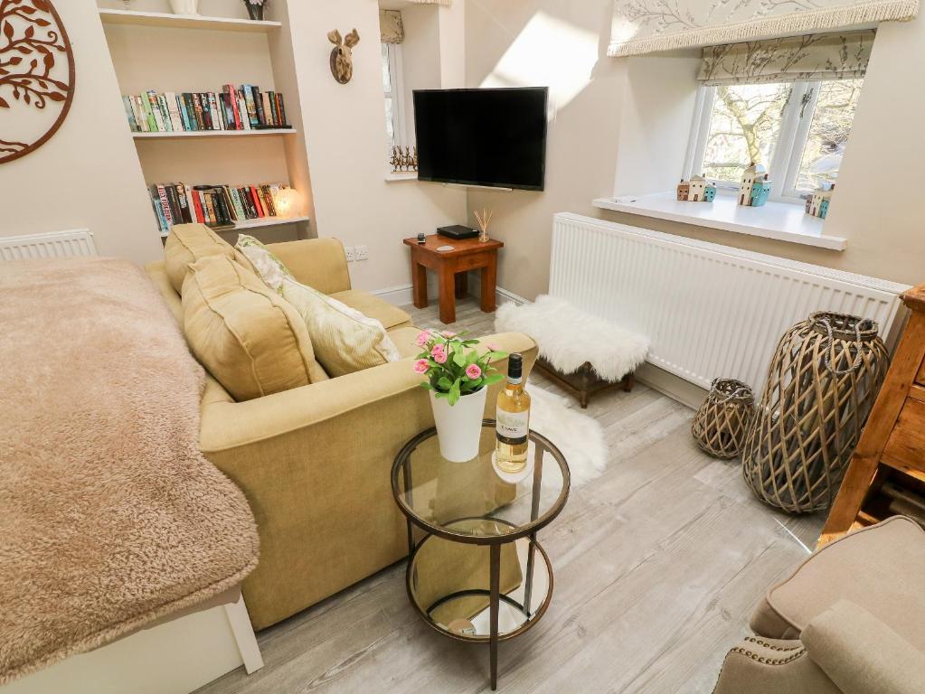 TV a/nebo společenská místnost v ubytování Lottie's Loft