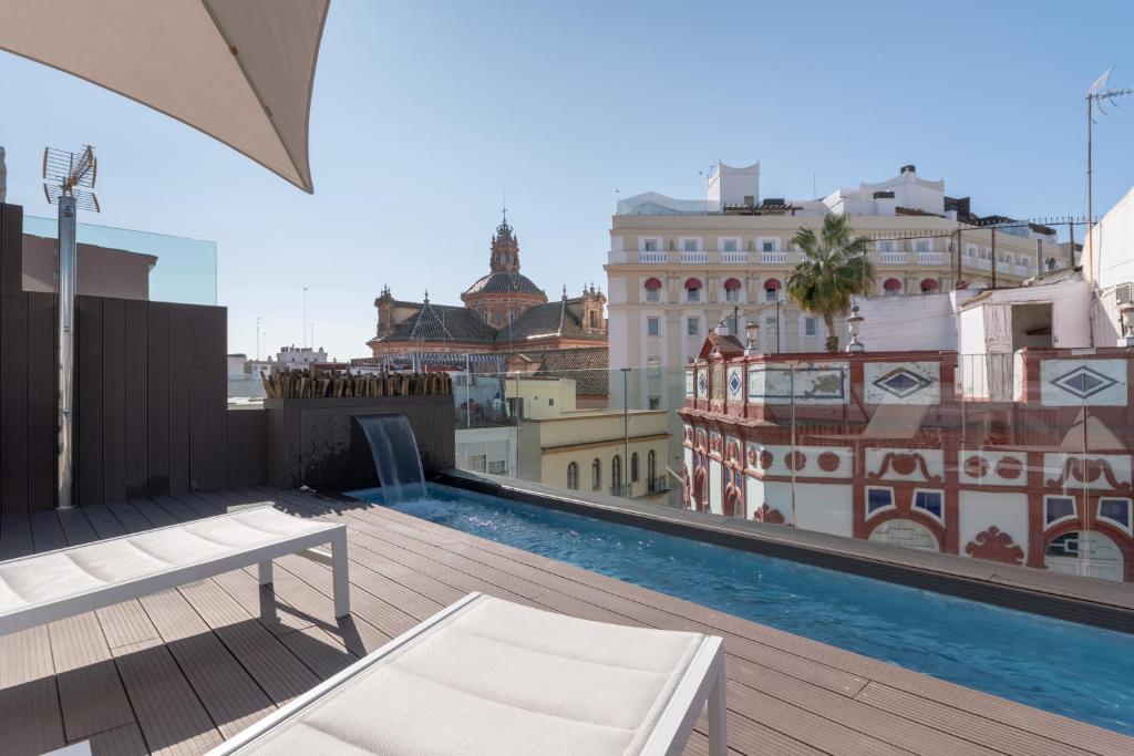 Bazén v ubytovaní Apartamentos Caminante del Agua alebo v jeho blízkosti
