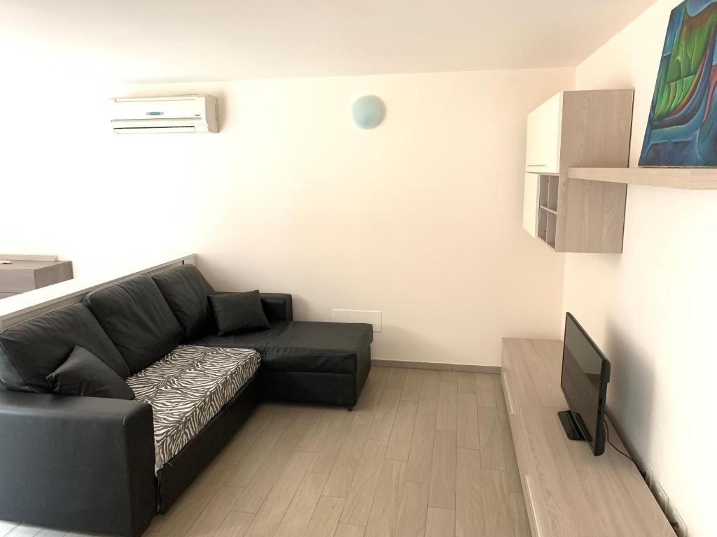 TV a/nebo společenská místnost v ubytování Camere e case vacanza Residenza Prealba