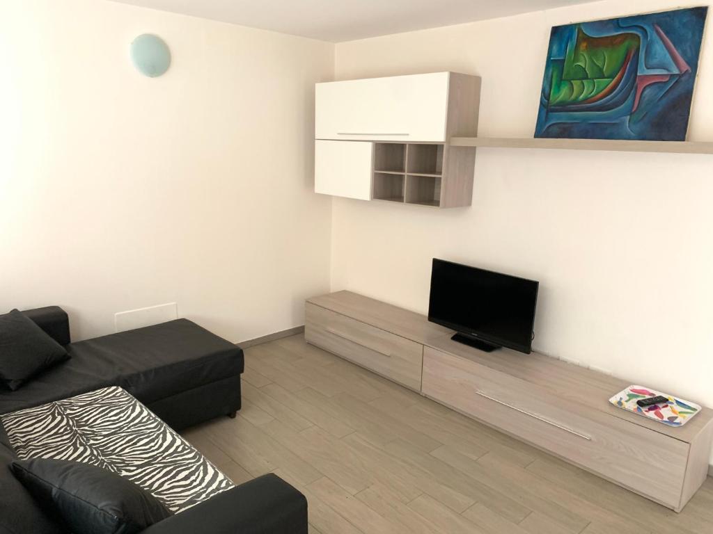 TV a/nebo společenská místnost v ubytování Camere e case vacanza Residenza Prealba