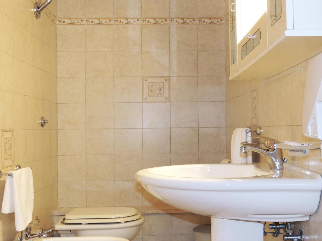 Koupelna v ubytování Hotel Porto Badisco