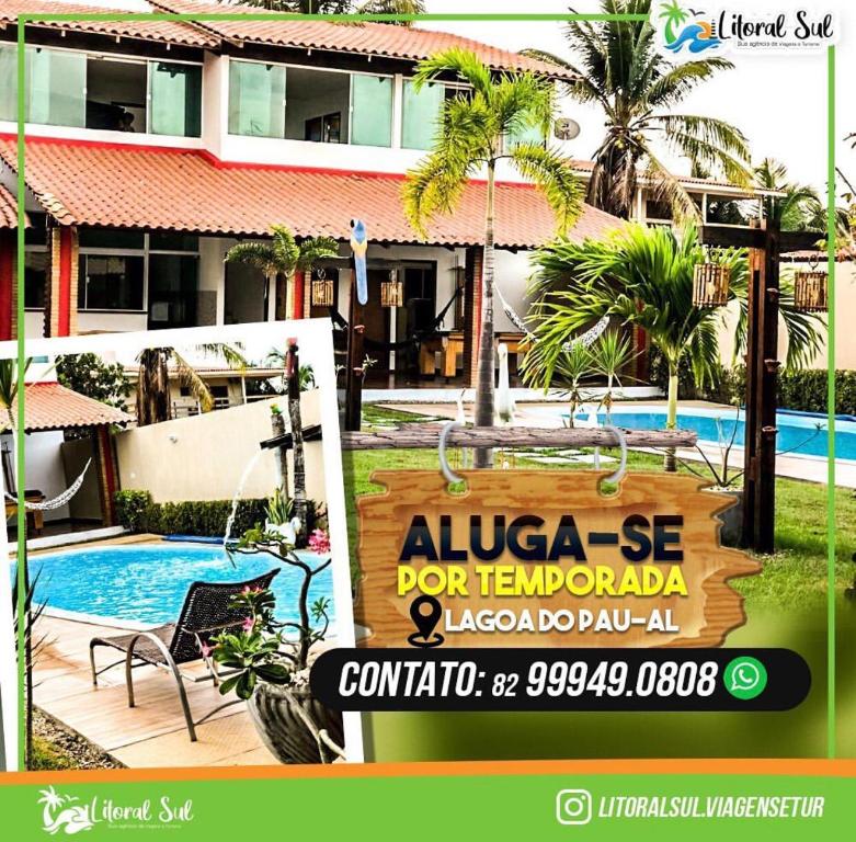 科魯里皮的住宿－Casa de temporada, Lagoa do Pau Coruripe-AL，一座带游泳池的房子前面的标志