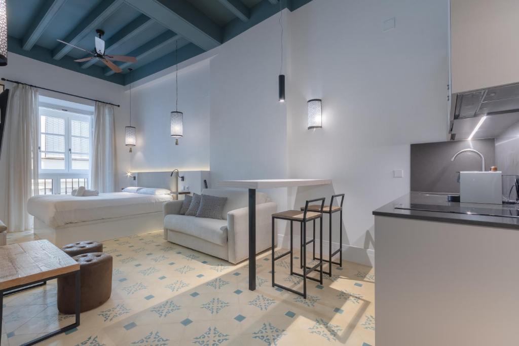 Posteľ alebo postele v izbe v ubytovaní Apartamentos Caminante del Agua