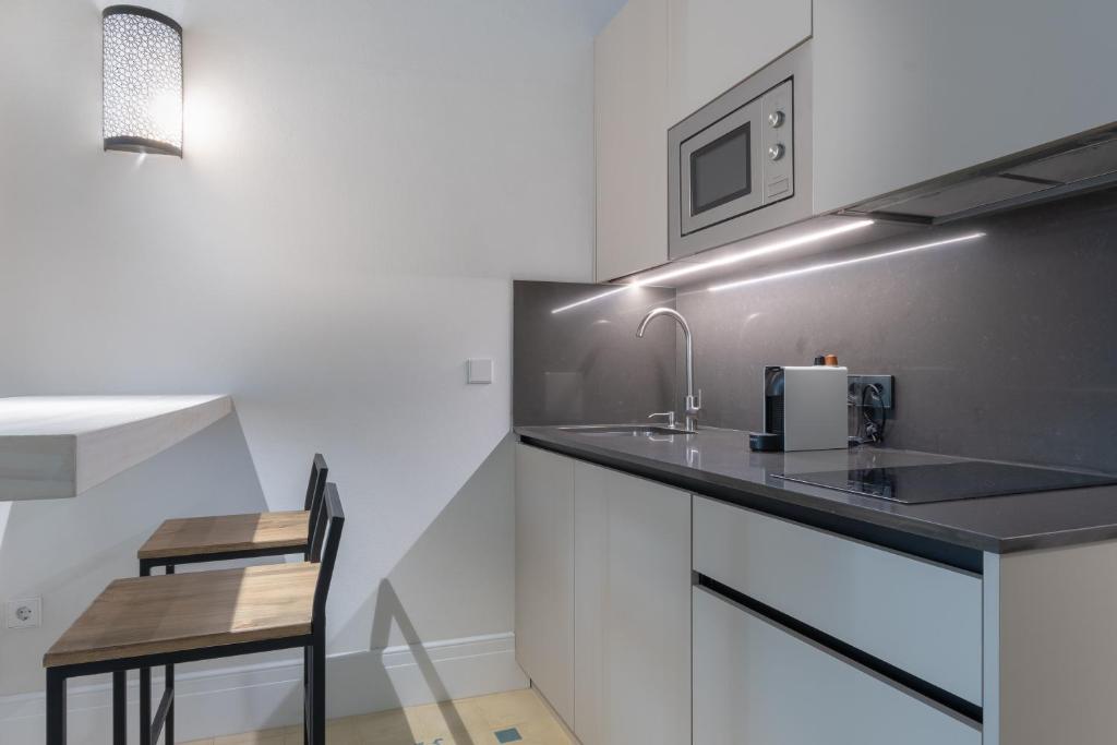 Kuchyňa alebo kuchynka v ubytovaní Apartamentos Caminante del Agua