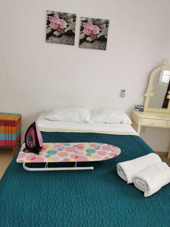 Postel nebo postele na pokoji v ubytování Terraza Tuxtla