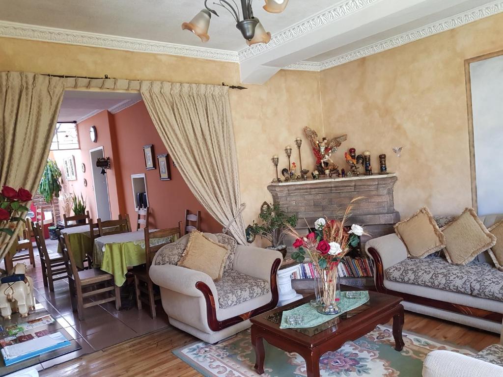 Posezení v ubytování Petite Maison