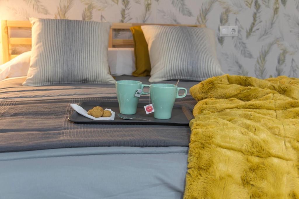 A bed or beds in a room at Tándem House