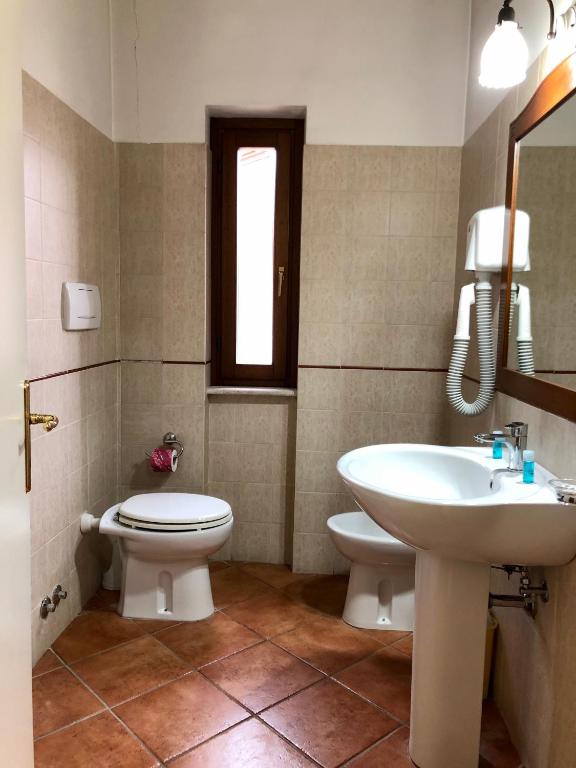 Koupelna v ubytování Mingone Hotel Ristorante