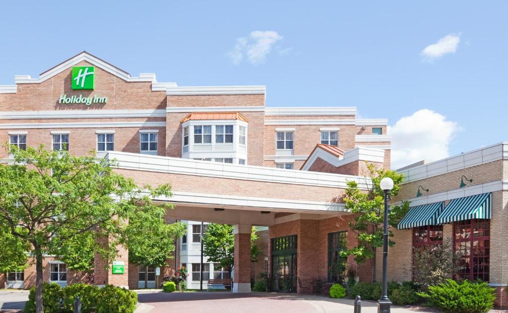 a rendering of the front of a hotel at Holiday Inn & Suites Downtown La Crosse, an IHG Hotel in La Crosse